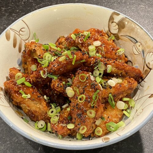 A bowl of Korean fried chicken wings