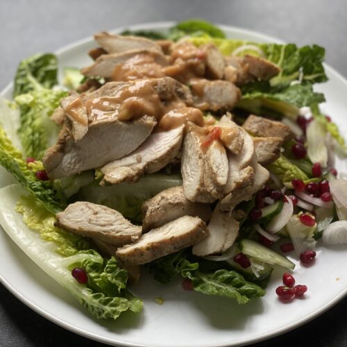 Chicken satay salad on a plate