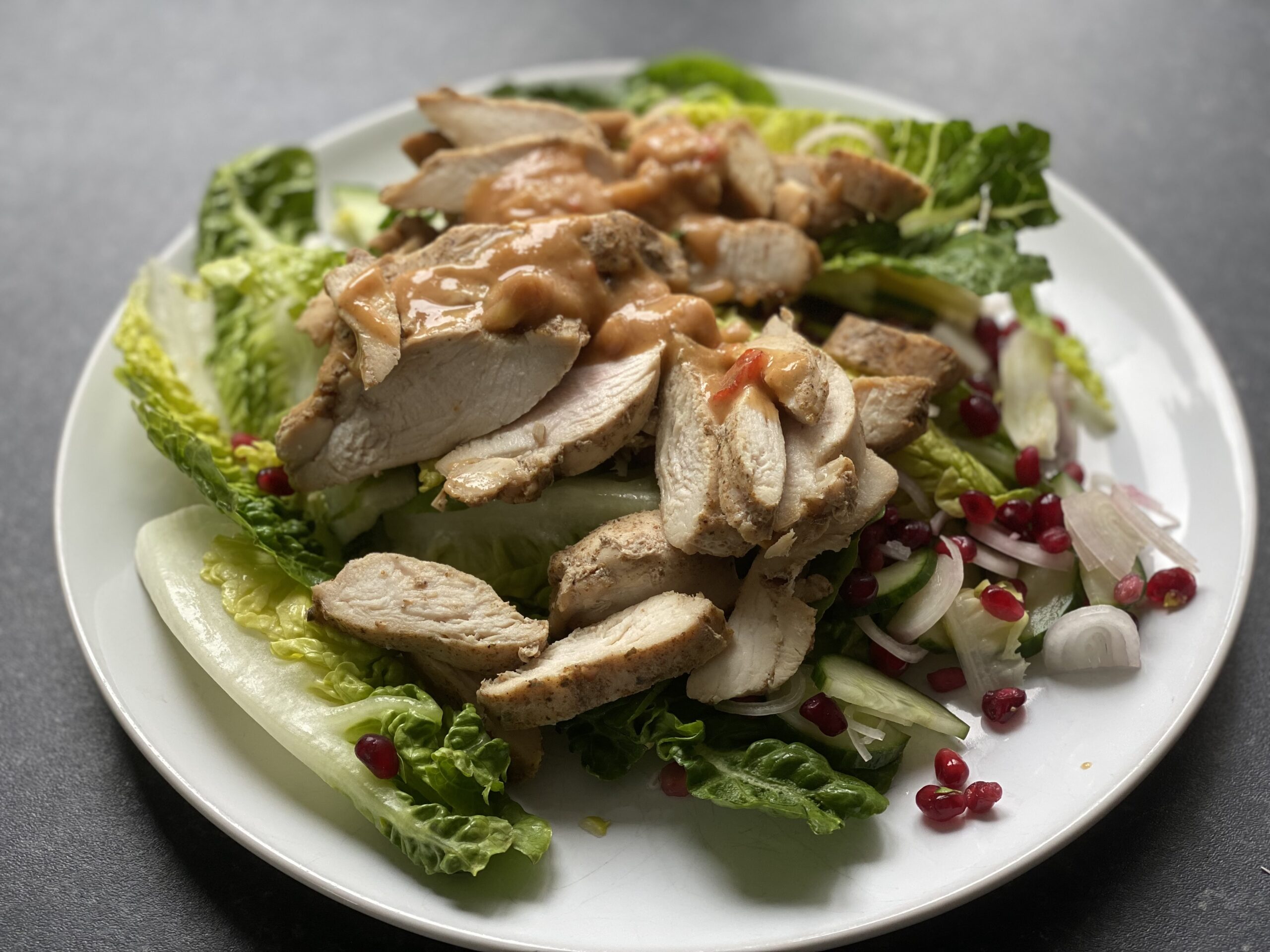 Chicken satay salad on a plate