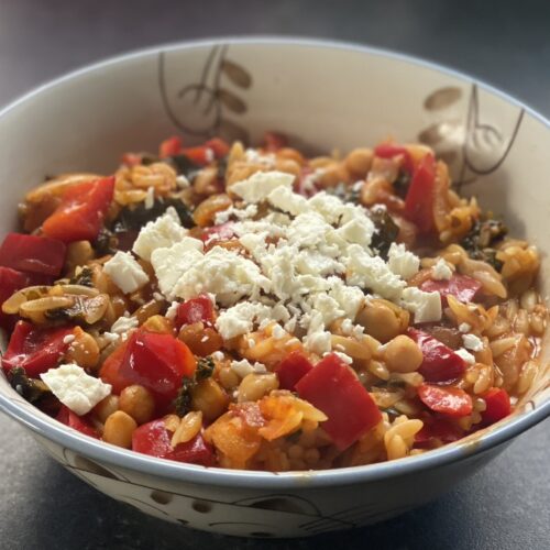 Bowl of Greek orzo with feta