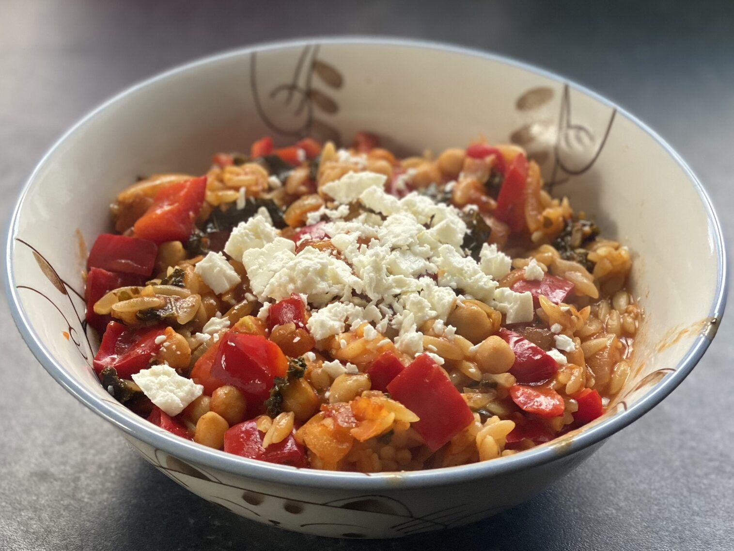 Bowl of Greek orzo with feta